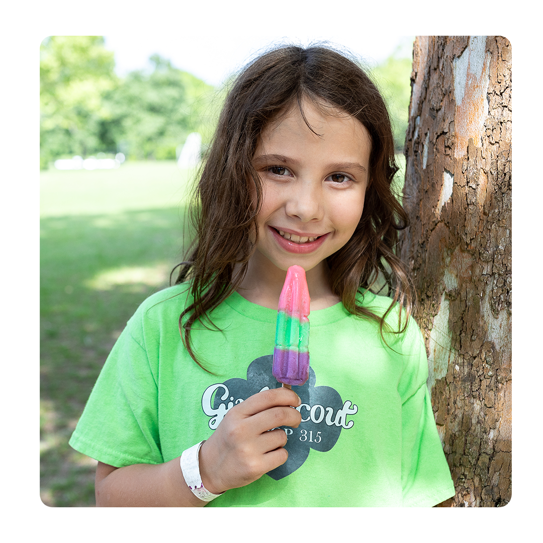 girl holding popsicle